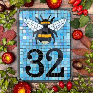Mosaic house number with a bee