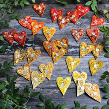 Fabric heart brooches in oranges and yellows